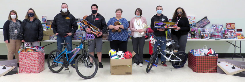 Members of Genesis Jeep Coalition donated toys to the Wayne County Office of Children and Youth Services.